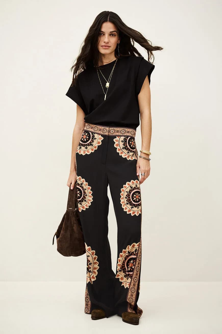 VALLA patterned flared trousers